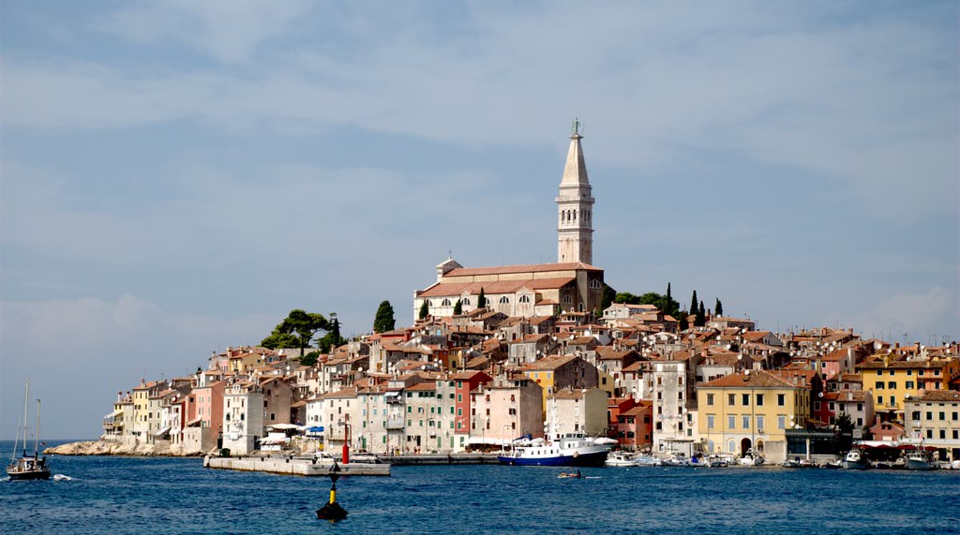 The old town of Rovinj with the bell tower of St Euphemia's church above the sea, west coast of Istria